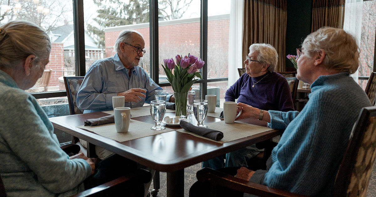 seniors dining in an assisted living community