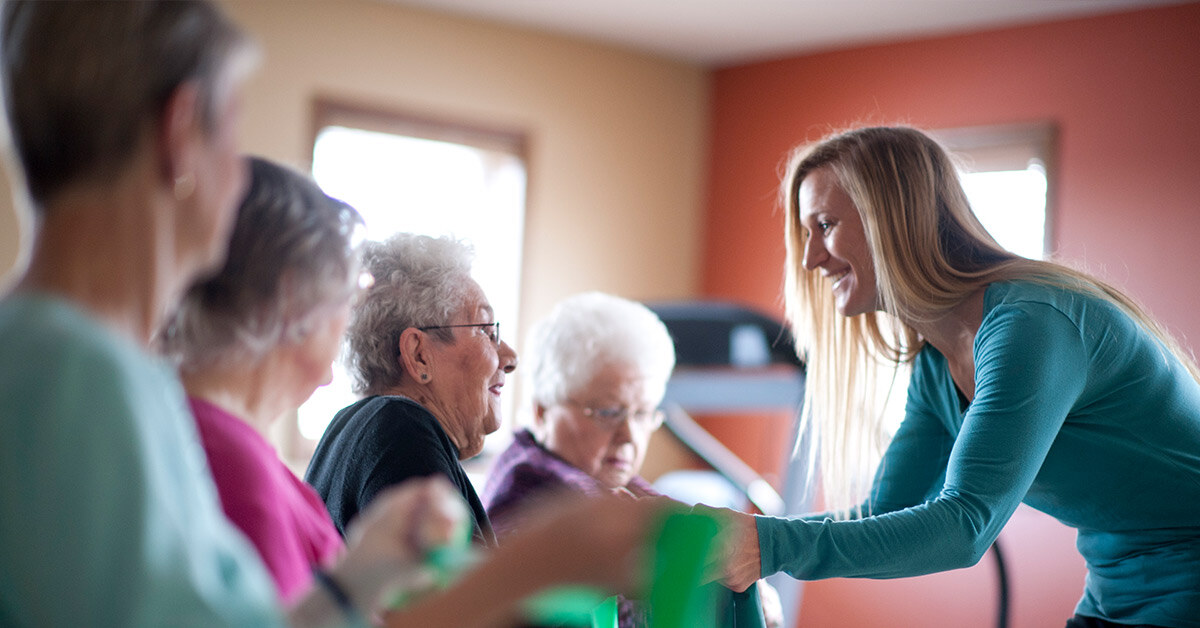 older adults exercising in assisted living