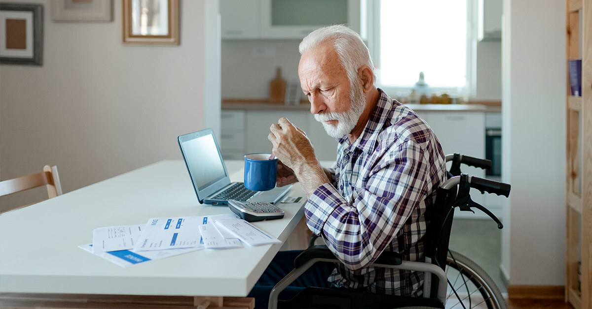 man reviewing assisted living qualifications for seniors